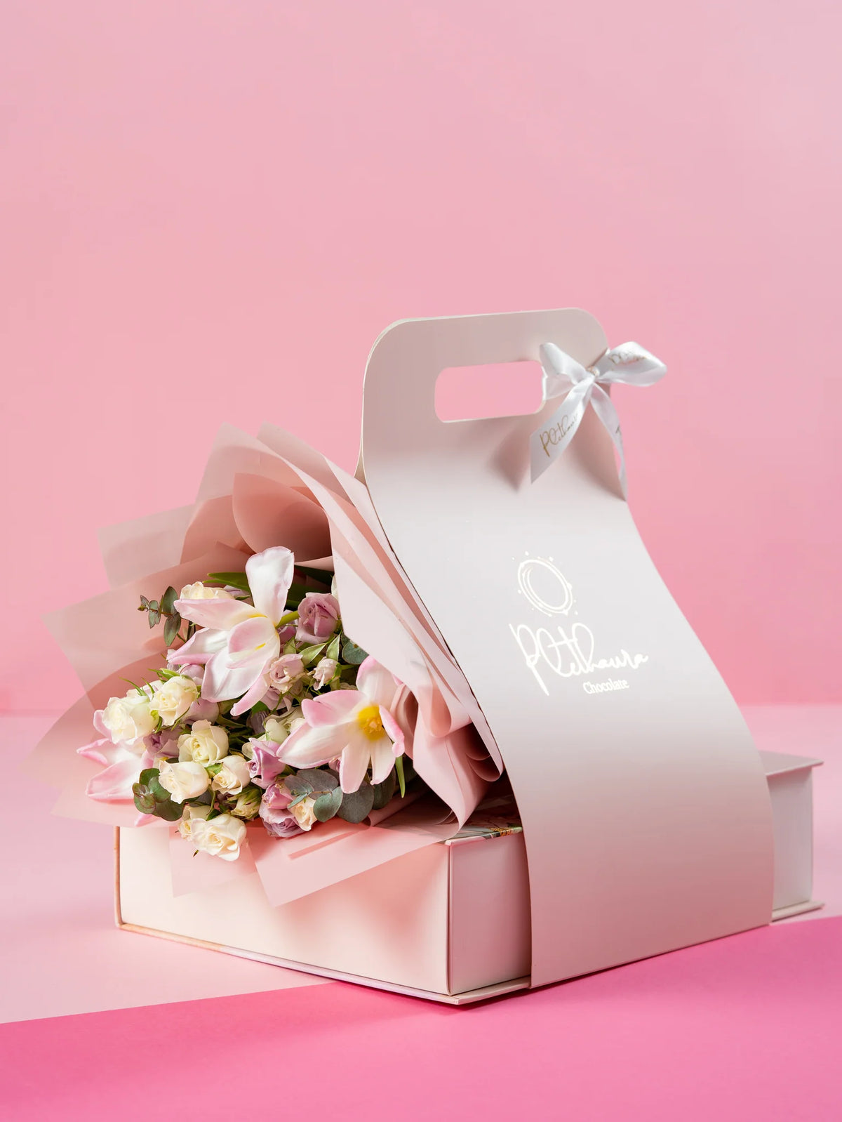 Snowy Bloom Bouquet (Packaging comes only if love box chocolate inside)